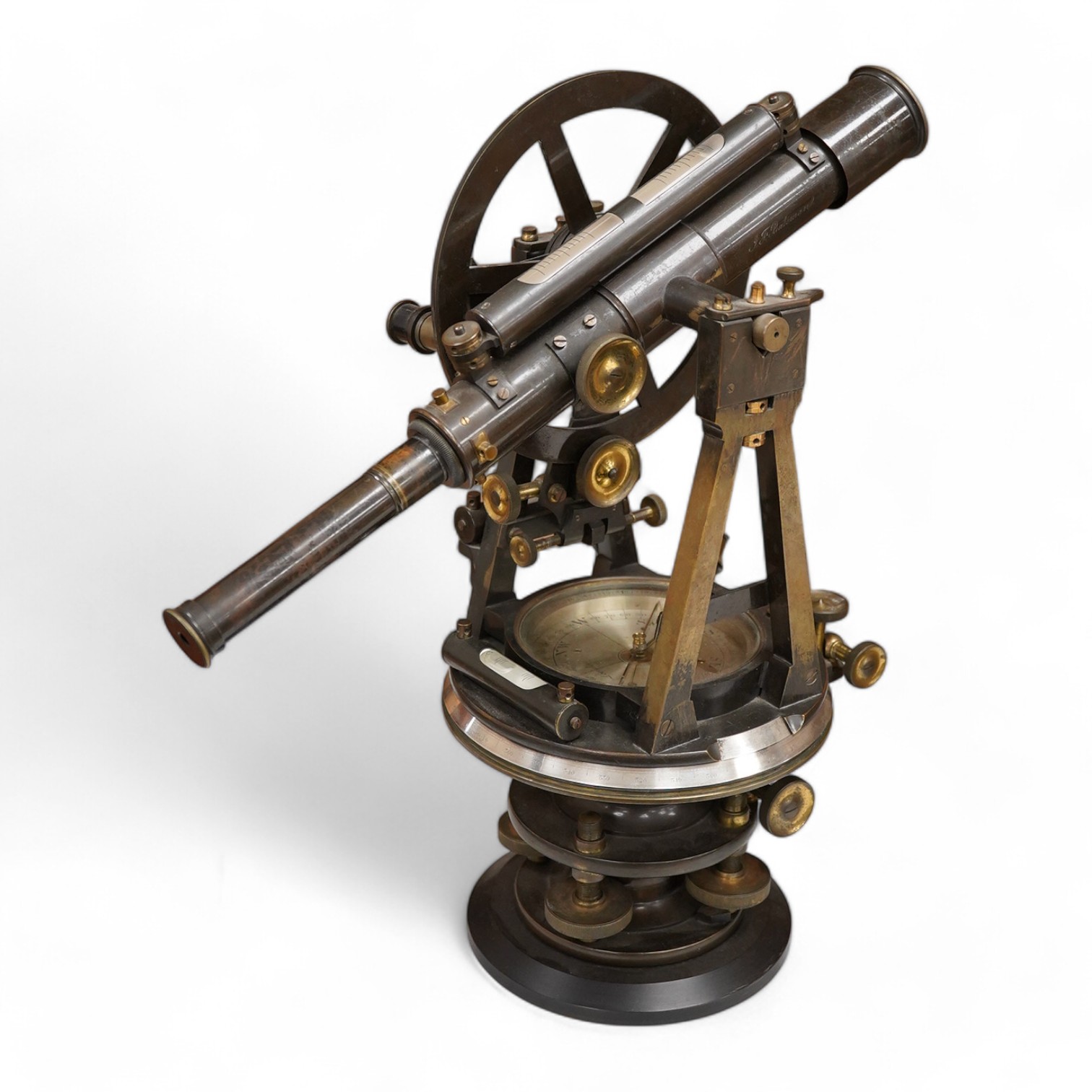 A mid 19th century Elliott Bros., London theodolite and teak tripod, with owner’s engraved name for John Frederick Bateman, the theodolite has been mounted on a later base for display.